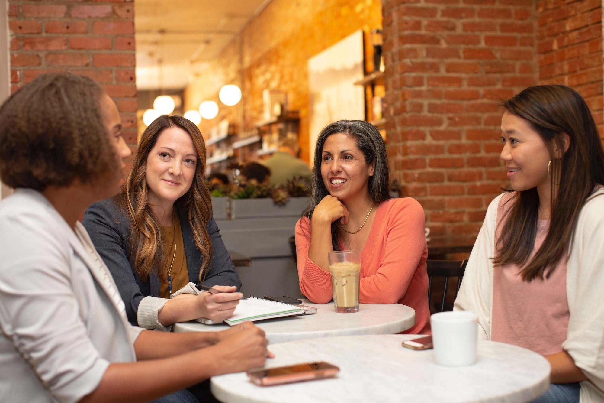 Women discussing our programs.